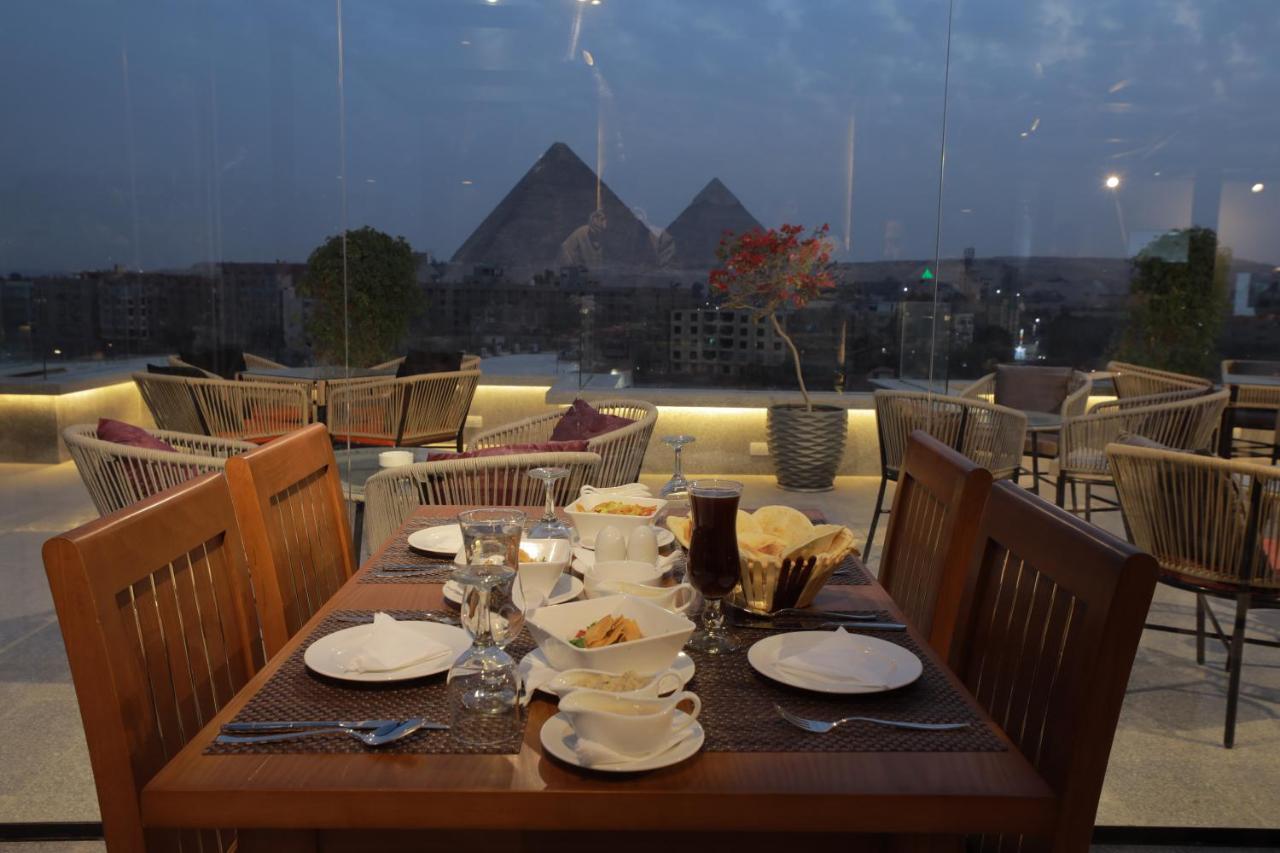 Pyramid Front Hotel Al Kawm al Akhdar Bagian luar foto