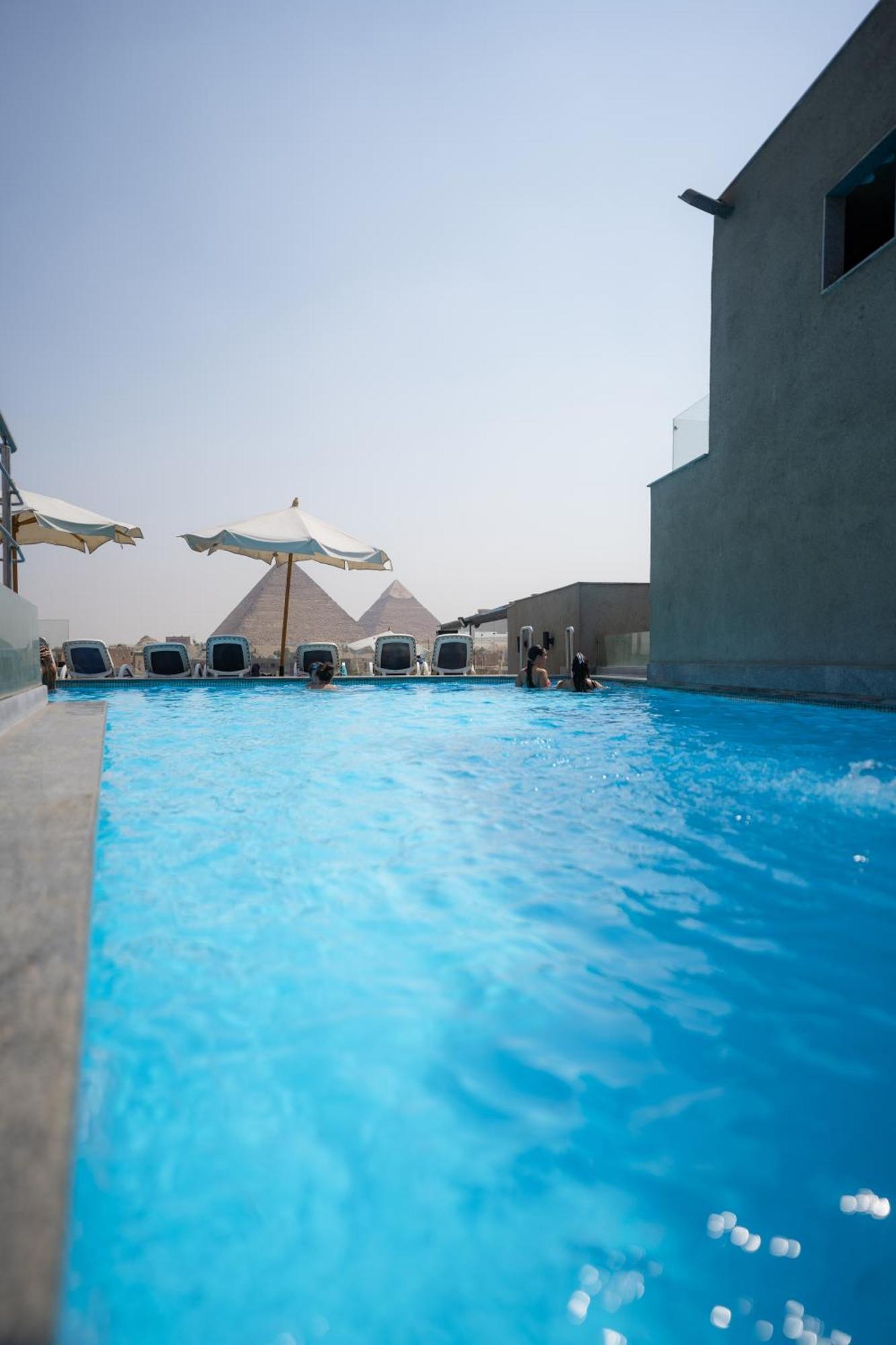 Pyramid Front Hotel Al Kawm al Akhdar Bagian luar foto